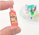 1/10 scale miniature alcohol bottles. 2 bottles per bag.