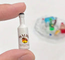 1/10 scale miniature alcohol bottles. 2 bottles per bag.