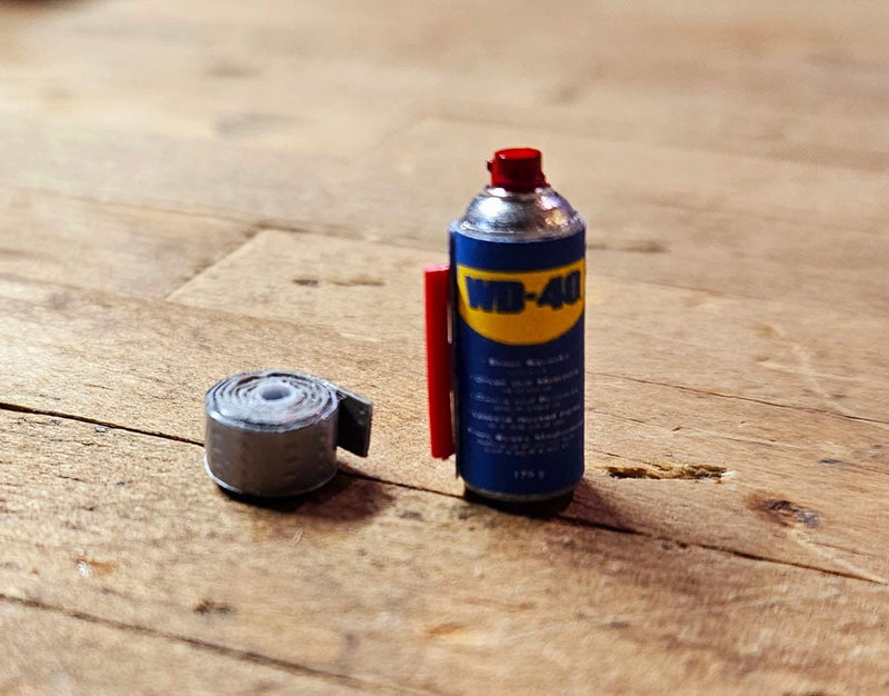 WD40 and a roll of duct tape. By True North Rc