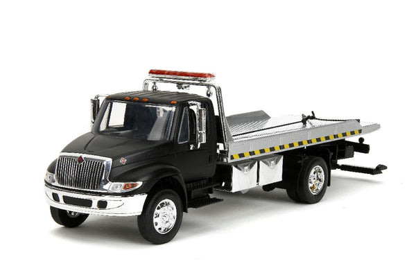 Jada 1/24 International Flatbed Tow Truck  - Primer Black. **Special order** 4 to 6 weeks shipping delay.