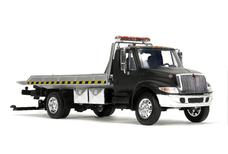 Jada 1/24 International Flatbed Tow Truck  - Primer Black. **Special order** 4 to 6 weeks shipping delay.