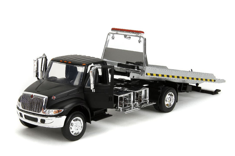 Jada 1/24 International Flatbed Tow Truck  - Primer Black. **Special order** 4 to 6 weeks shipping delay.