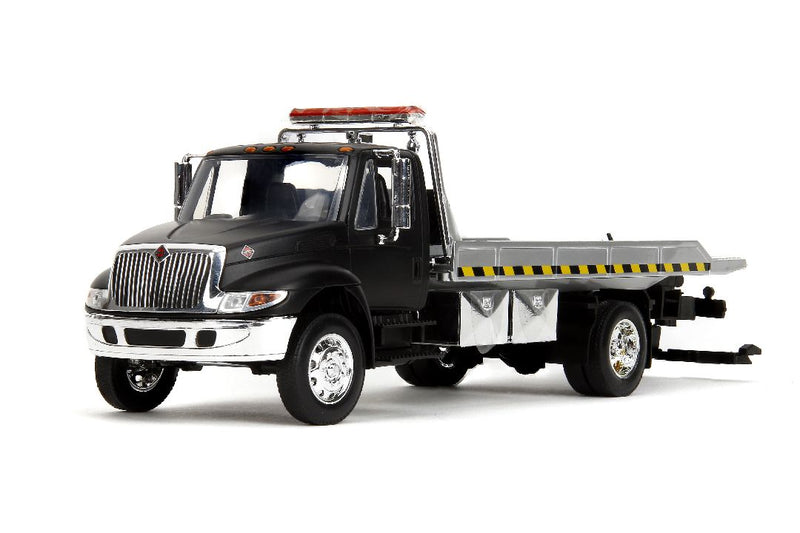 Jada 1/24 International Flatbed Tow Truck  - Primer Black. **Special order** 4 to 6 weeks shipping delay.