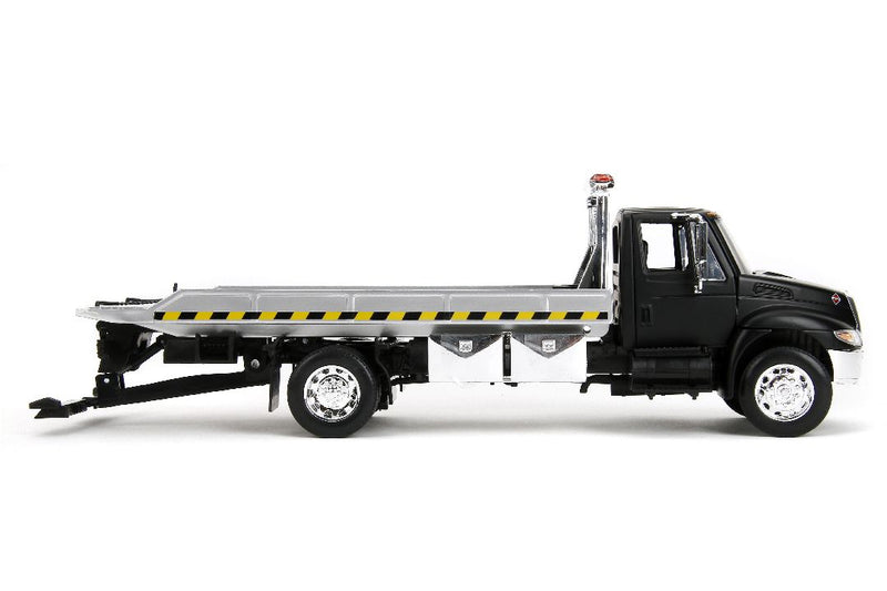 Jada 1/24 International Flatbed Tow Truck  - Primer Black. **Special order** 4 to 6 weeks shipping delay.