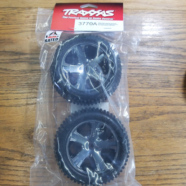 Traxxas Rustler tires and wheels assembled 2.8" All-Star black chrome