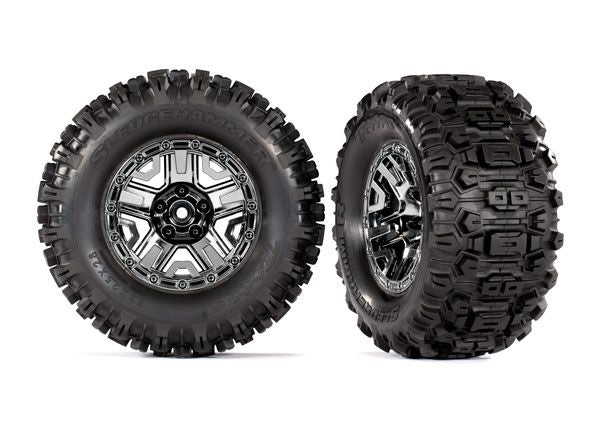 Traxxas Tires & wheels, assembled, glued (black chrome 2.8" wheels, Sledgehammer tires, foam inserts) (2) (TSM rated)