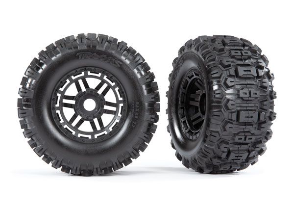 Traxxas Sledgehammer Tires & wheels, assembled, glued (black wheels, dual profile (2.8" outer, 3.6" inner), Sledgehammer tires, foam inserts) (2) (17mm splined) (TSM rated)